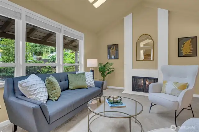 Large windows overlook the front of the house