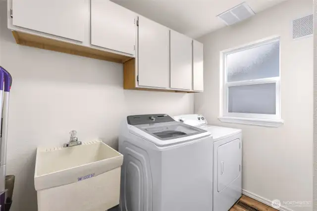 Laundry Room with utility sink and lots of additional storage