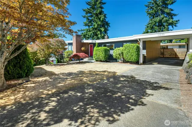 Nicely landscaped for privacy without sacrificing the abundant interior light.
