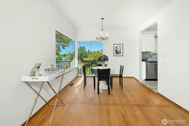 What about double French doors or sliding glass wall between the living and dining rooms?