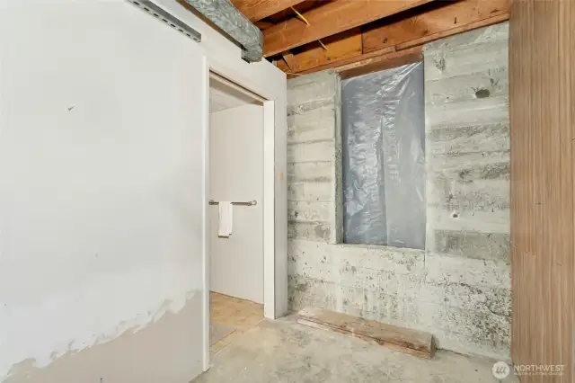 What is that opening?! Glad you asked - it's completely unfinished and could be anything. Expand the 1/2 bath, add a lower kitchen or wine cellar, storage, you make the call.