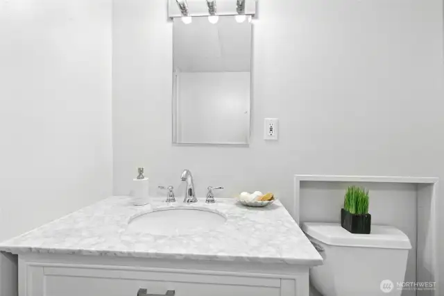 Lower level 1/2 bath with space to expand, if desired.