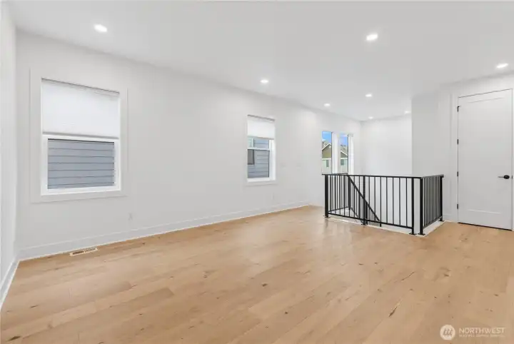 Loft with more open railing