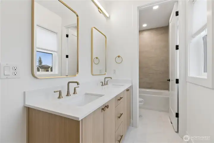Hall Bath (Double Sinks, Bathtub and Shower Combo w/Full Height Tile)