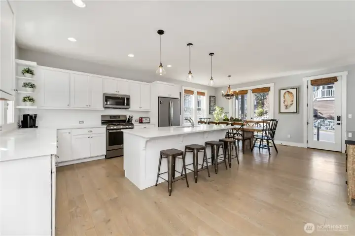 Gourmet kitchen adjacent to front entry