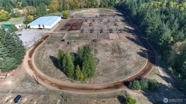 This PNW icon boasts a 220 X 100 indoor arena, 265 X 115 outdoor arena, 28 paddocks with shelters, 1/2 mile track, cattle pens, round pen, wash rack, ample lighted parking for events, 2-RV hook ups plus so much more
