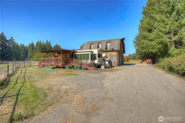 As you approach the residence you will see the addition living quarters - this RV is available for purchase outside of closing.