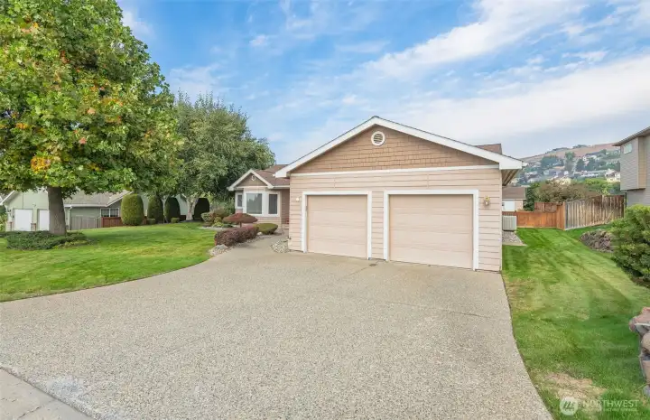 The area right of the garage could be made into parking for toys if desired.