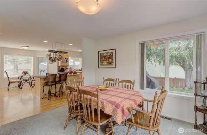 Formal Dining Room enjoys open flow into the Kitchen and Cafe' Nook.