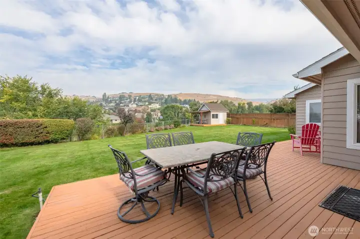 Kitchen and Dining Room open out to a sprawling composite deck.