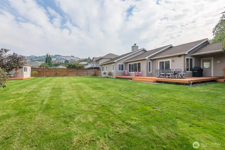 Ideal back yard for pool, soccer, or croquet parties.