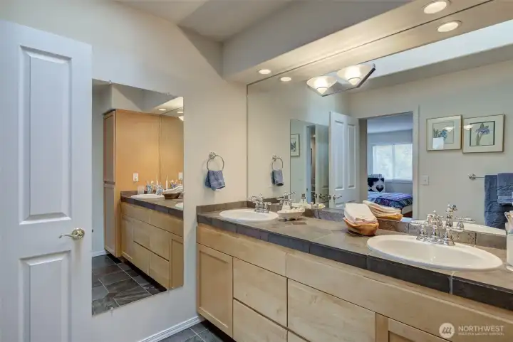 Primary bath is contemporary and well-appointed.