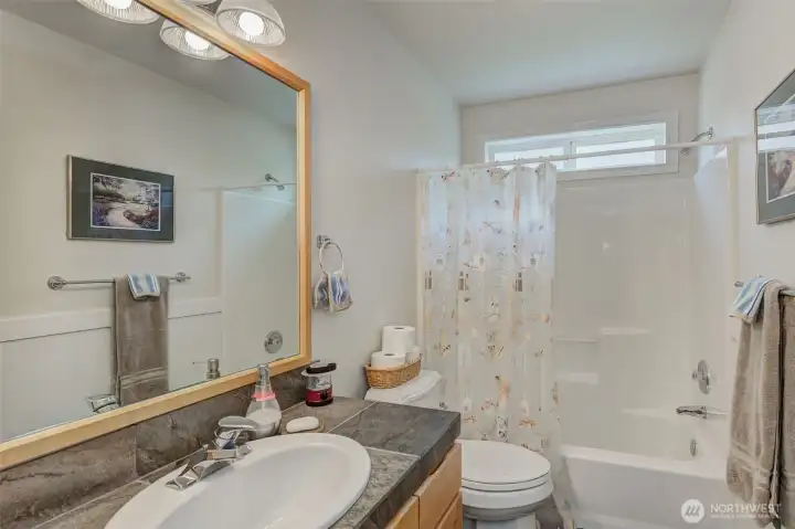 Main Bathroom updated with contemporary finishes.