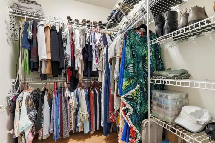 Large walk-in closet with plenty of space for storage and organization.