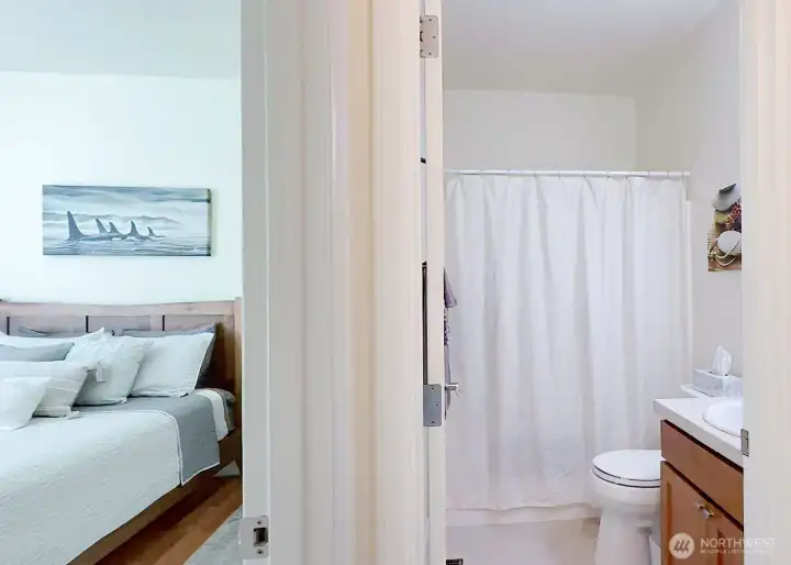Full guest bathroom conveniently located next to the second bedroom.