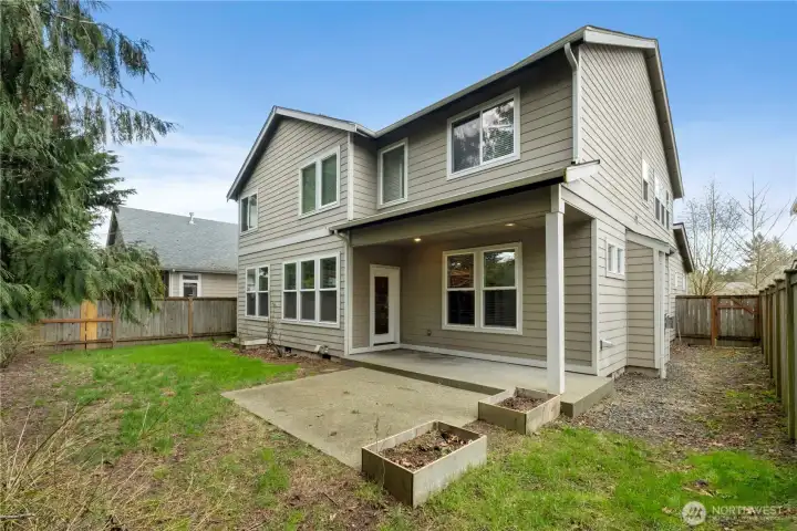 Fully Fenced backyard , Covered patio area for BBQ's - Trees for privacy .