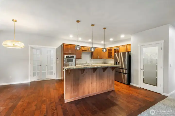 Open Concept Kitchen , Flex room with double doors . Could be six bedroom , Office ON Main Floor !