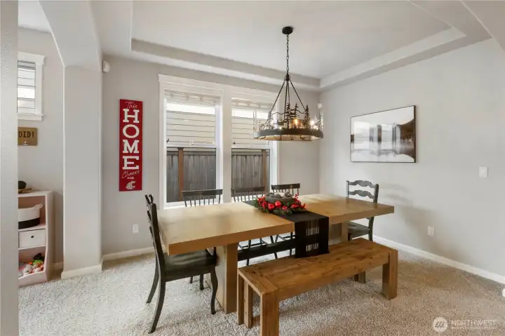 Rounded corners and coffered celining in the dining room