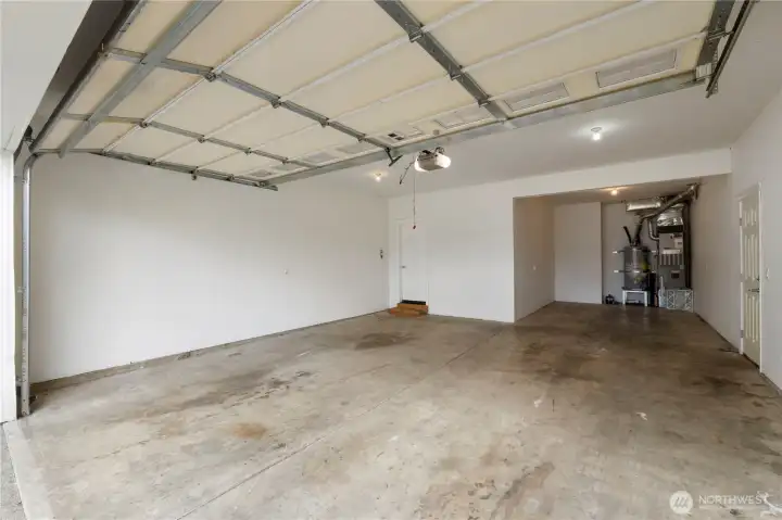 Deep 3 car tandem garage . Gas Forced air Heat with A/C Gas Hot Water as well