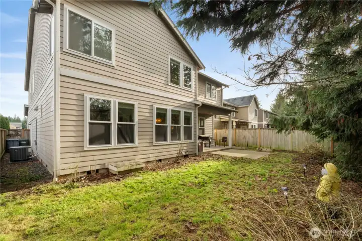 Fully Fenced with 2 gates . Man door from your 3 car tandem garage + A/C unit !