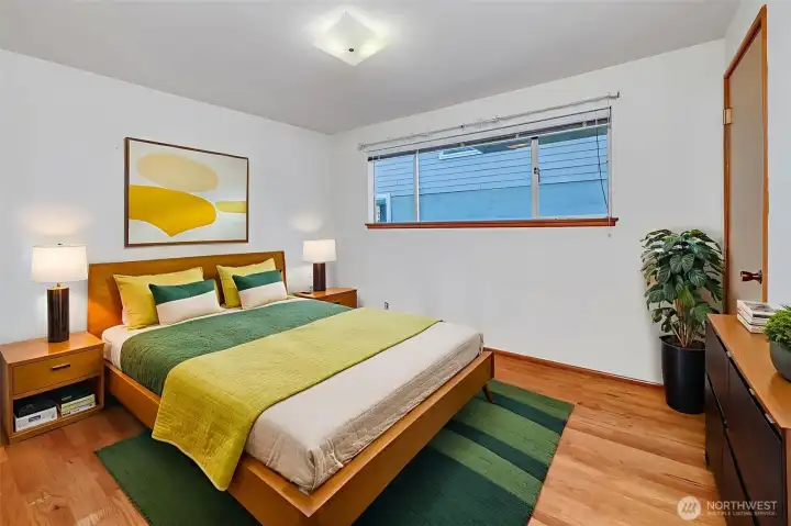 Bedroom 1 with East facing window. (VR staged)