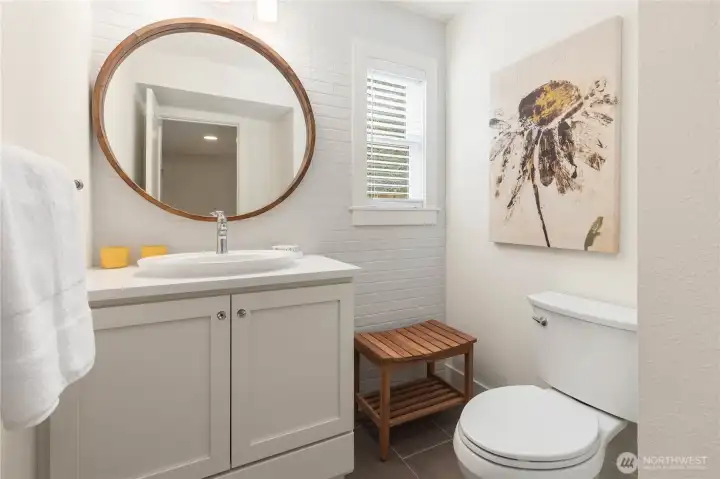 Light & airy powder room.