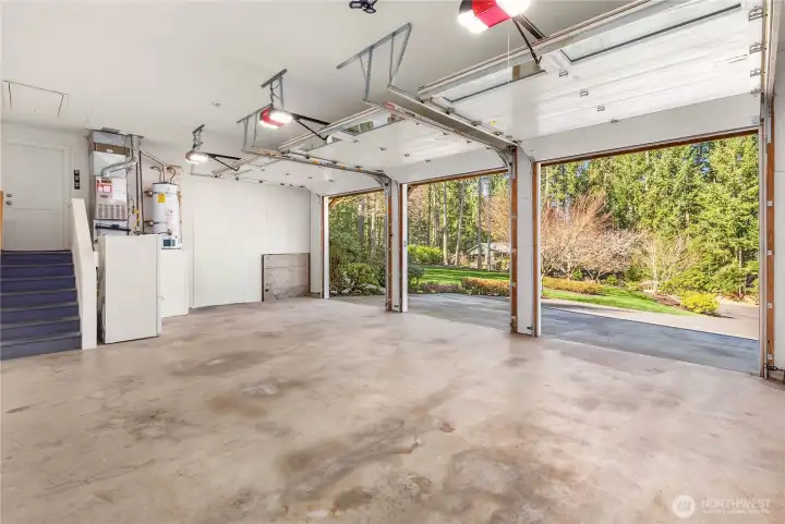 This garage is massive! 9'wide by 10' tall doors offer entry for the Sprinter van or prized Sports car.