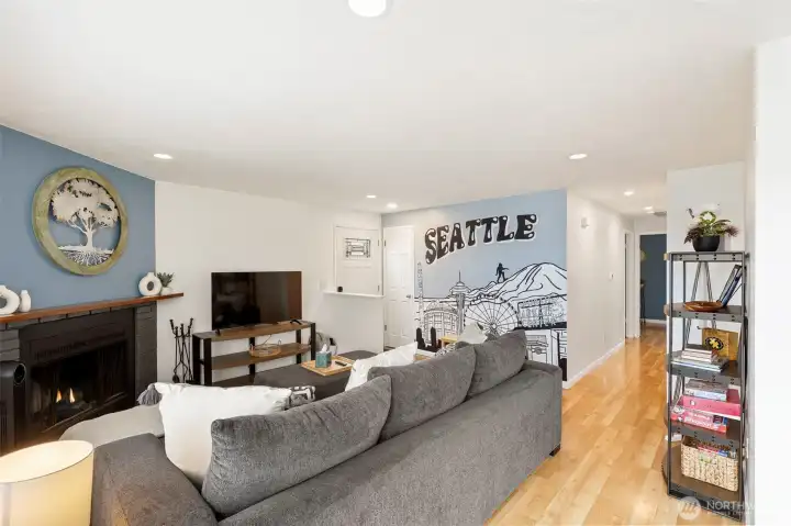 Living room mural: Seattle downtown highlights, the bottom is a stencil of the Seattle skyline. Find Sasquatch!