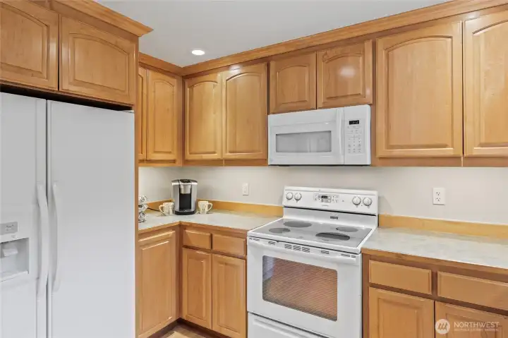 Pretty maple cabinetry.