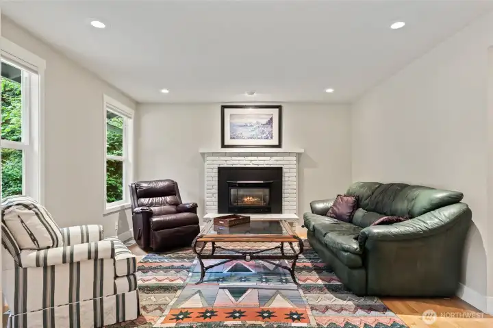 Gas burning fireplace invites relaxation.