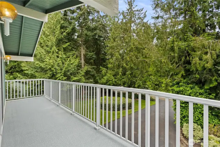 What a place to hang out and enjoy the sunshine on this deck off primary bedroom!