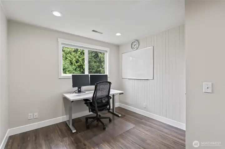 Office looks out to your spacious yard. Upstairs features updated luxury vinyl flooring.