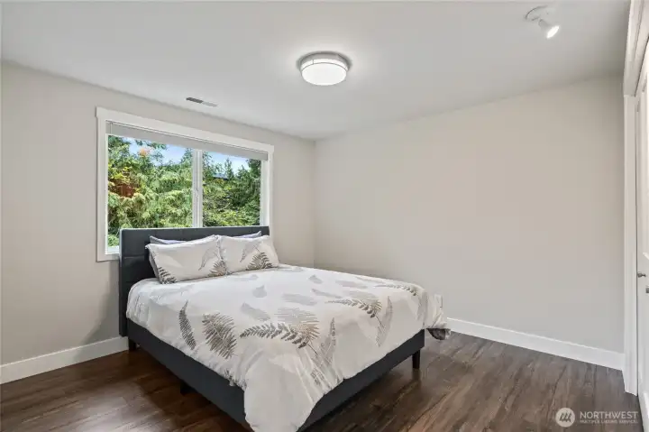 There are 3 bedrooms upstairs in addition to the primary bedroom and the office. Room for everything!
