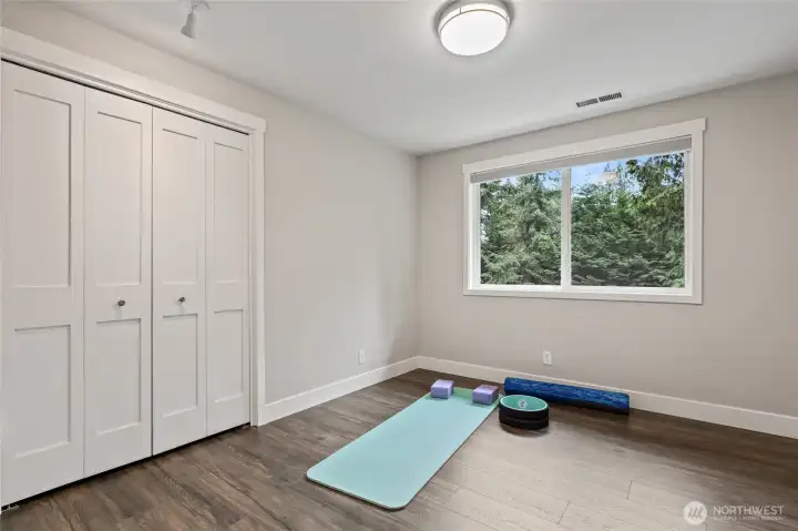 Could you use a room for exercise?  Plenty of room for another queen bed or twins. Maybe a nursery?