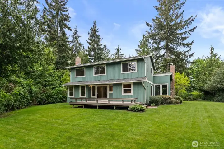 Massive backyard space for gatherings. Volleyball? Playset? Whatever your heart desires.
