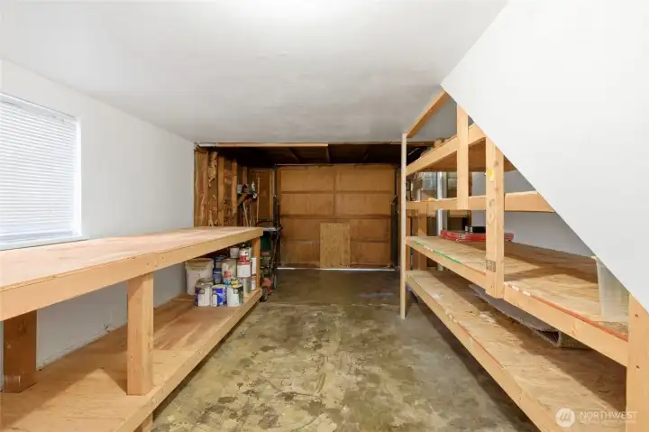 Attached 1 car garage with storage.