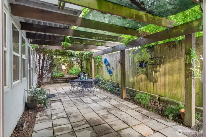 The crown jewel: an ultra-private, trellis-covered central courtyard designed for year-round outdoor living