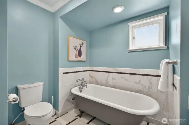 Main-level living space offering remarkable flexibility — easily convertible to a third or fourth bedroom