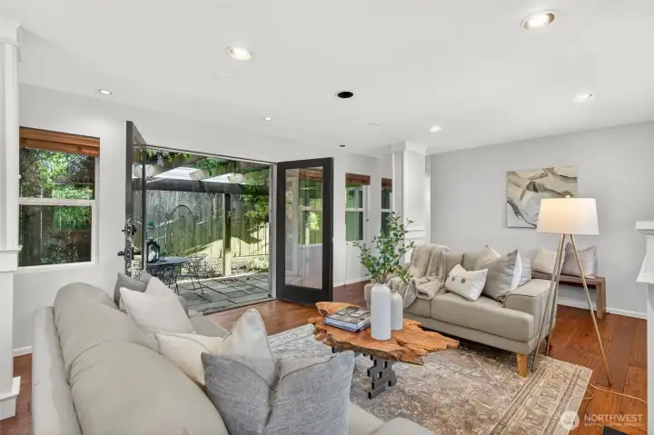 Trellis detail overhead filters natural light into the courtyard, creating a sun-dappled retreat in any season