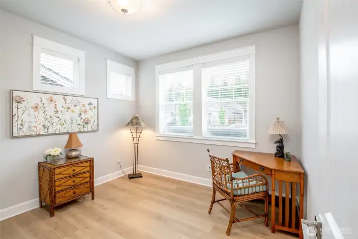 This pretty room at the front of the home is perfect for a guest room, office or studio space.