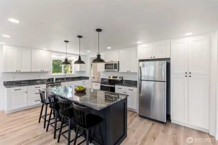 Completely remodeled kitchen! Granite counter tops and oversized island! Completely remodeled kitchen! Granite counter tops and oversized island!