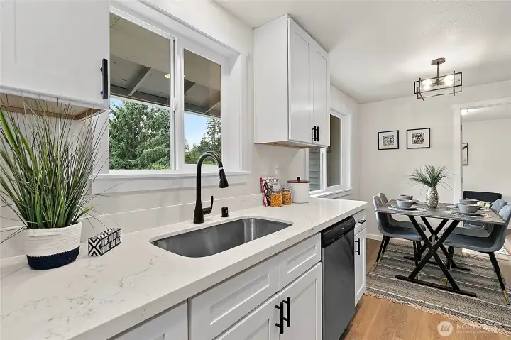 Many upgrades, including quartz countertops in kitchen and bathroom. LVP flooring throughout - no carpet.