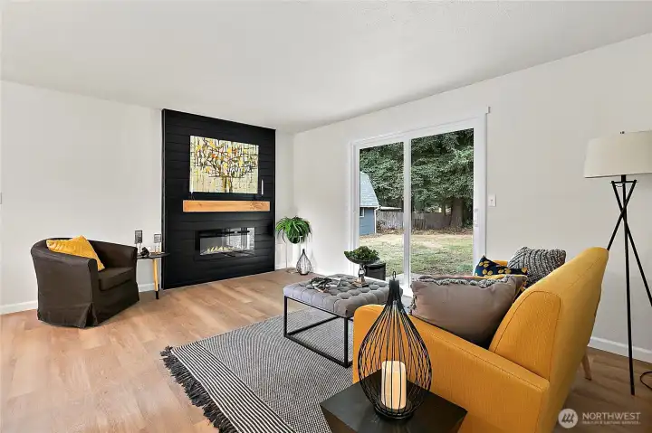 Stunning linear fireplace with beautiful mantle.
