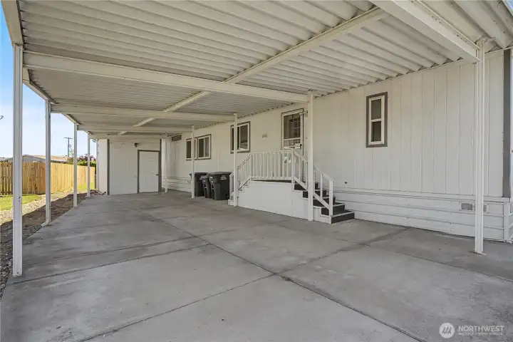 Carport with storage shed at the end parking area Carport with storage shed at the end parking area