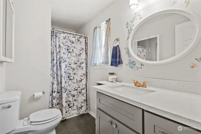Beautiful cabinet, bright space, LVP flooring, and shower