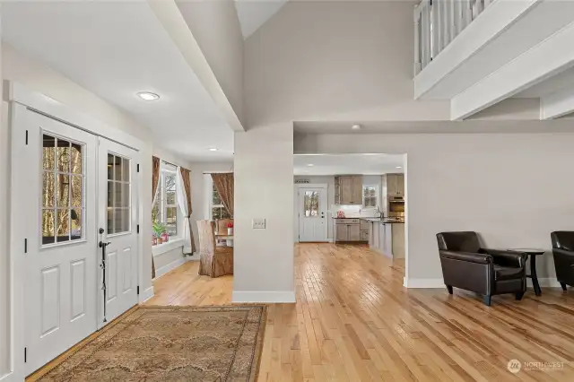 Entryway leading to living room and kitchen