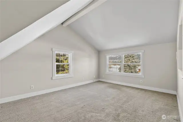 This room is a great flex space with lots of natural light. It would make a great office or den.