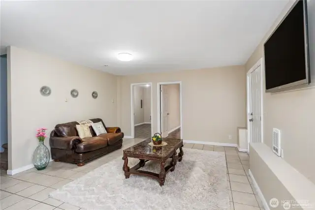 ADU living space showing the separate entrance to the ADU as well as both downstairs bedrooms.