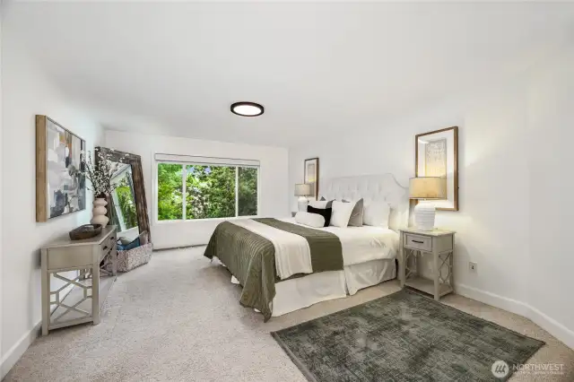 Double doors lead to your spacious primary bedroom