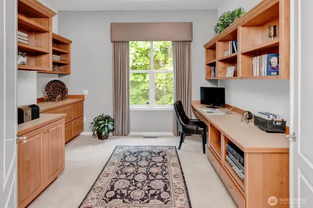 Den/ office with loads of built in's . There is a door to the den for quiet reflection